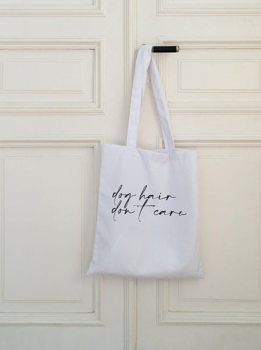 Dog hair, don't care Cotton Tote Bag